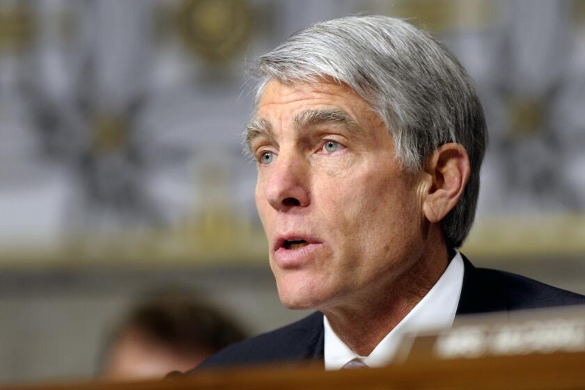Sen. Mark Udall apologized for invoking two dead U.S. journalists in a debate over the weekend.