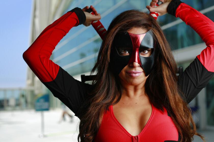 Christina Garcia of San Diego attends Comic-Con on Saturday as Lady Deadpool.