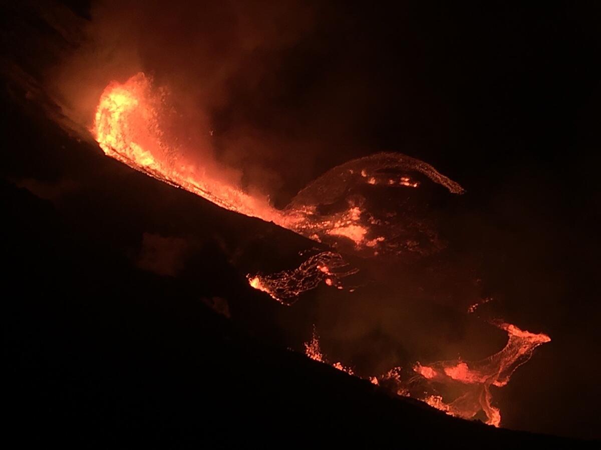 Lava flows inside the Halema’uma’u crater of the Kilauea volcano Sunday.