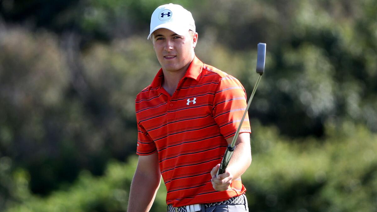 Jordan Spieth reacts after putting for eagle at No. 18 during the third round of the Hyundai Tournament of Champions on Saturday.