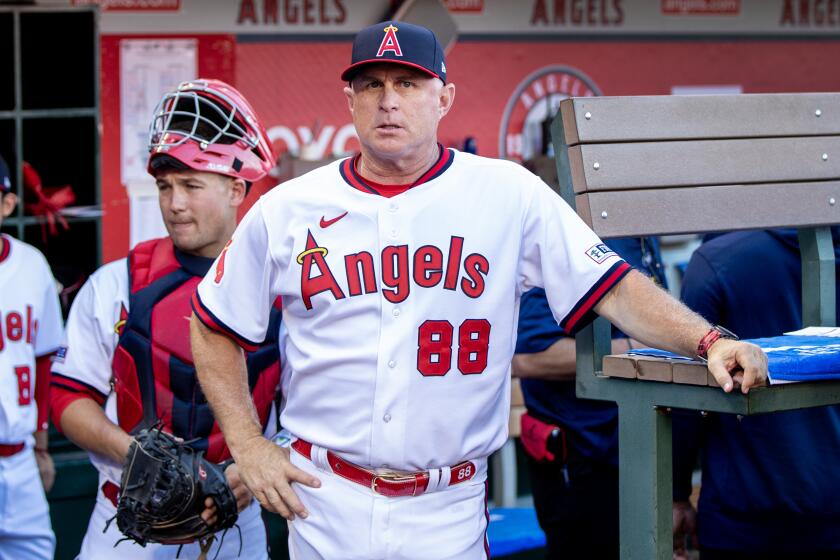Anaheim, CA - July 21: Angels manager Phil Nevin waits for the game to start with the Pirates at Angel Stadium.