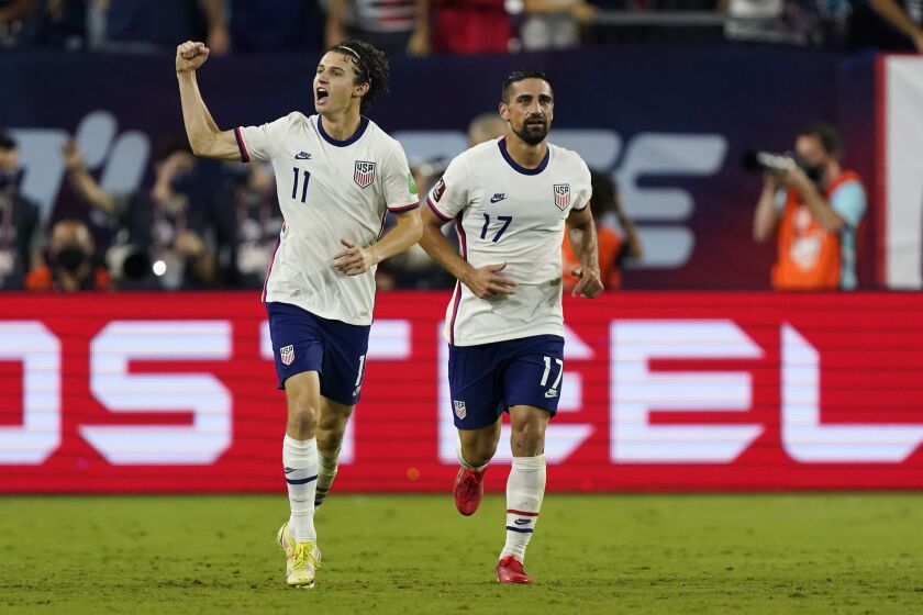 United States forward Brenden Aaronson (11) celebrates after scoring a goal against Canada during the second half of a World Cup soccer qualifier Sunday, Sept. 5, 2021, in Nashville, Tenn. (AP Photo/Mark Humphrey)