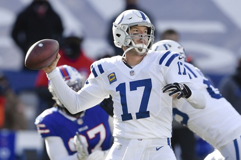 File- This Jan. 9, 2021, file photo shows Indianapolis Colts quarterback Philip Rivers (17) throwing a pass during the first half of an NFL wild-card playoff football game against the Buffalo Bills, in Orchard Park, N.Y. Rivers has won the Pro Football Writers of America's Good Guy Award for his cooperation with reporters, Tuesday, June 8, 2021. Rivers, who retired at 39 after one season with Indianapolis in 2020 following 16 years with the San Diego and Los Angeles Chargers, earned praise for consistently tackling all topics, even in a Zoom setting, and offering answers with perspective, wit and originality during his career.(AP Photo/Adrian Kraus, File)