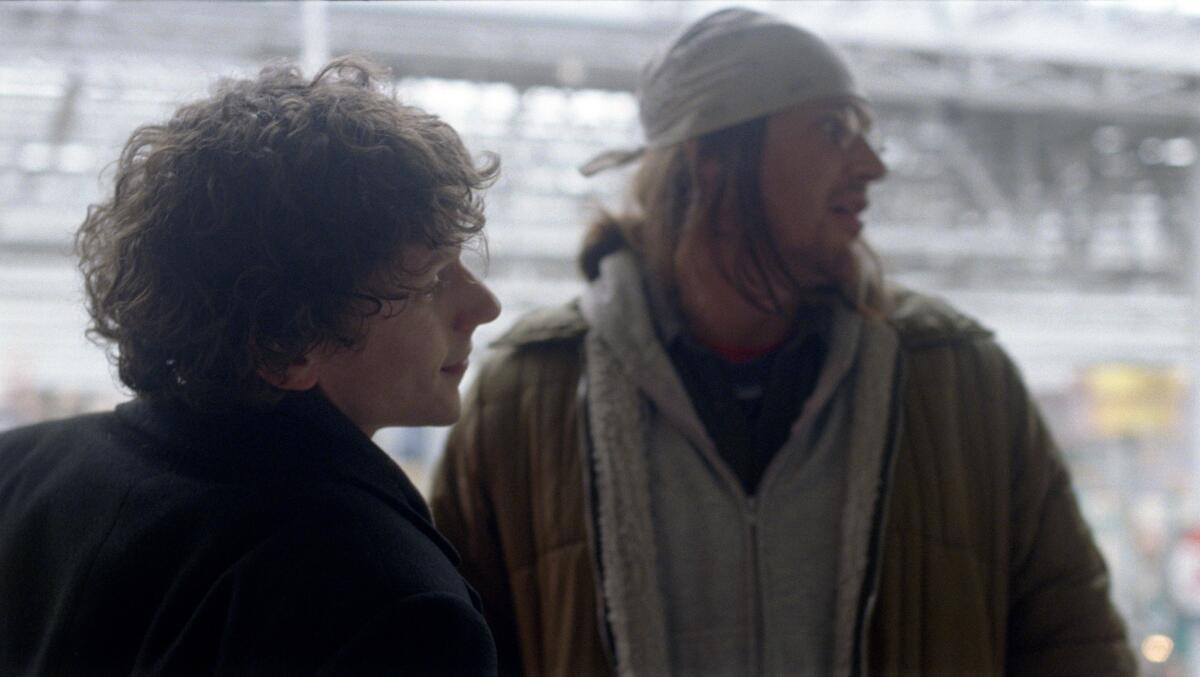 Jesse Eisenberg as David Lipsky, left, and Jason Segel as David Foster Wallace in "The End of the Tour."