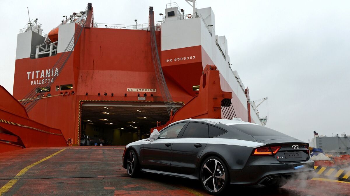 An Audi destined for export is loaded onto a ship in Bremerhaven, Germany. Bremerhaven is Europe's biggest port for car exports.