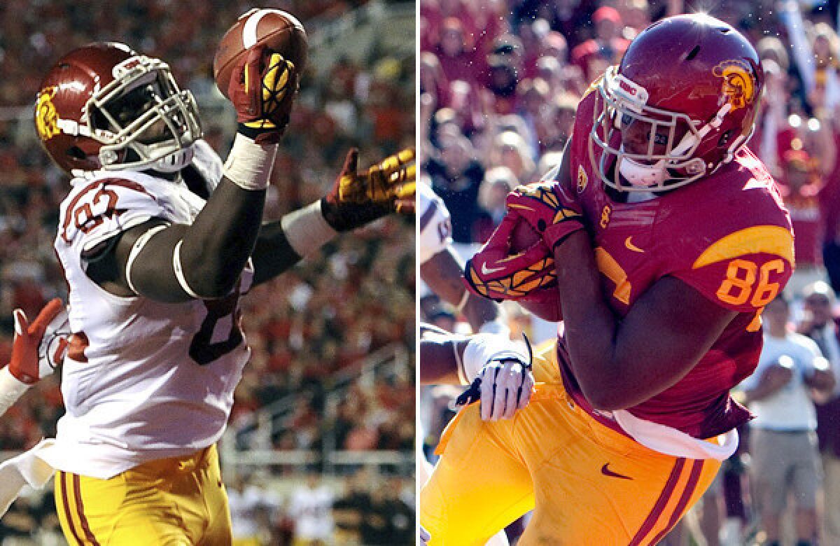 Randall Telfer (82) and Xavier Grimble (86) give USC a potent combination at tight end.