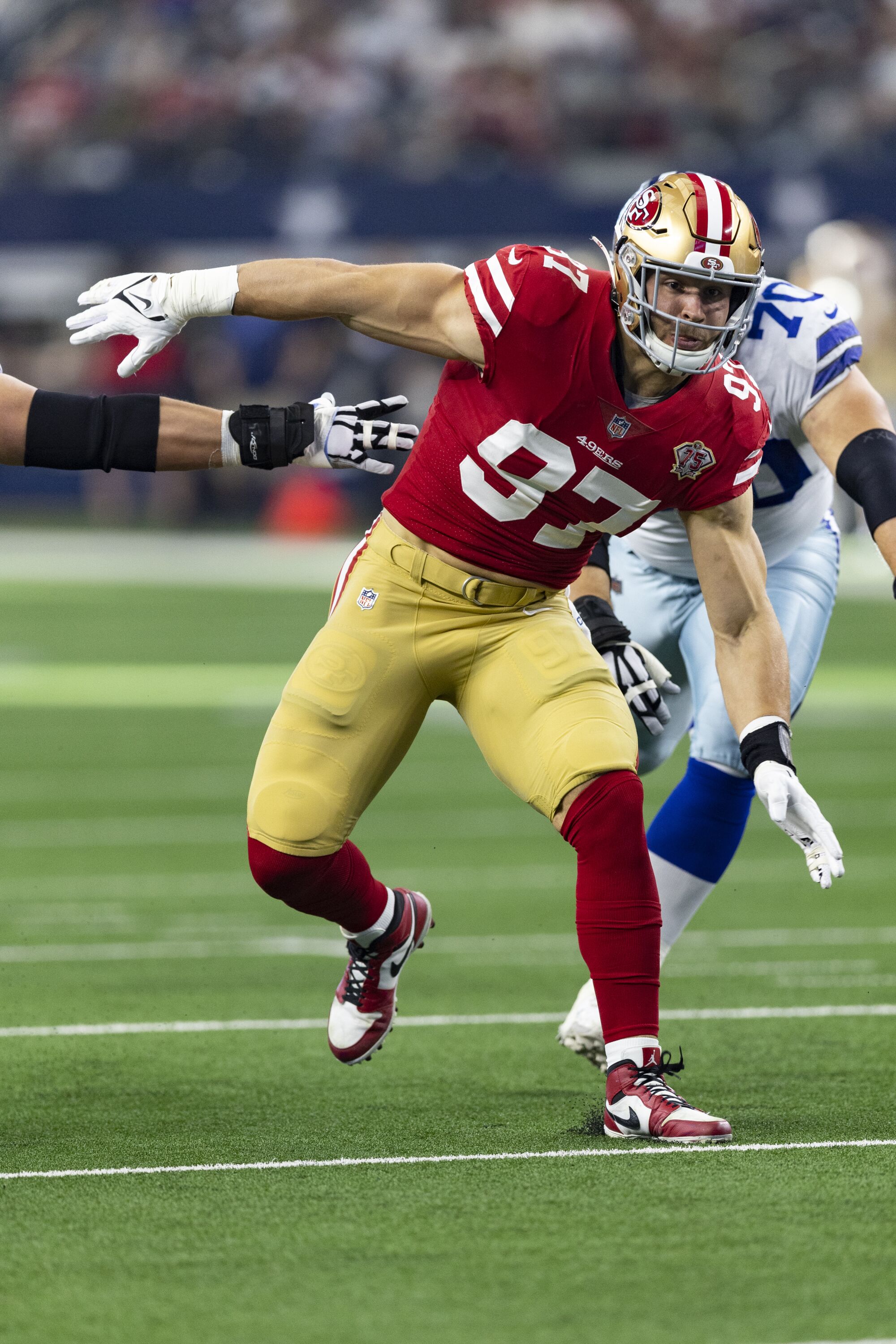 San Francisco 49ers defensive end Nick Bosa rushes the quarterback during a wild-card playoff win.