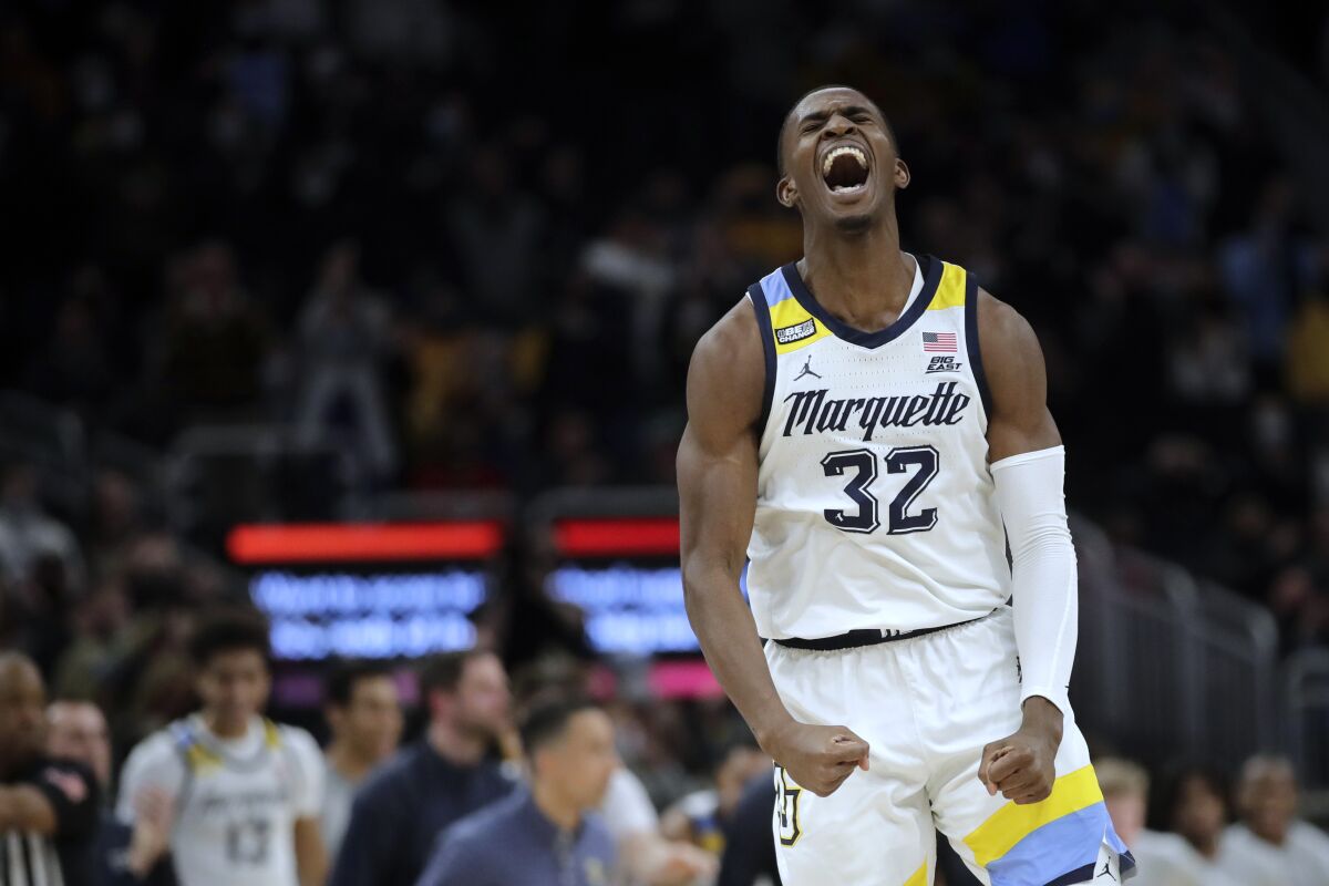 Marquette's Darryl Morsell react during the second half of the team's NCAA college basketball game against Villanova on Wednesday, Feb. 2, 2022, in Milwaukee. (AP Photo/Aaron Gash)