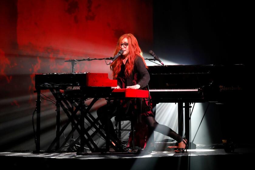 LOS ANGELES, CALIF. -- SUNDAY, DECEMBER 3, 2017: Tori Amos performs on her Native Invasion Tour at the Theatre at Ace Hotel in Los Angeles, Calif., on Dec. 3, 2017. (Gary Coronado / Los Angeles Times)