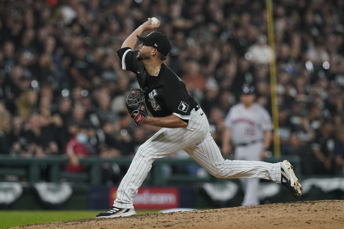 Ryan Tepera pitches for the Chicago White Sox in a playoff game against the Houston Astros in 2021. 