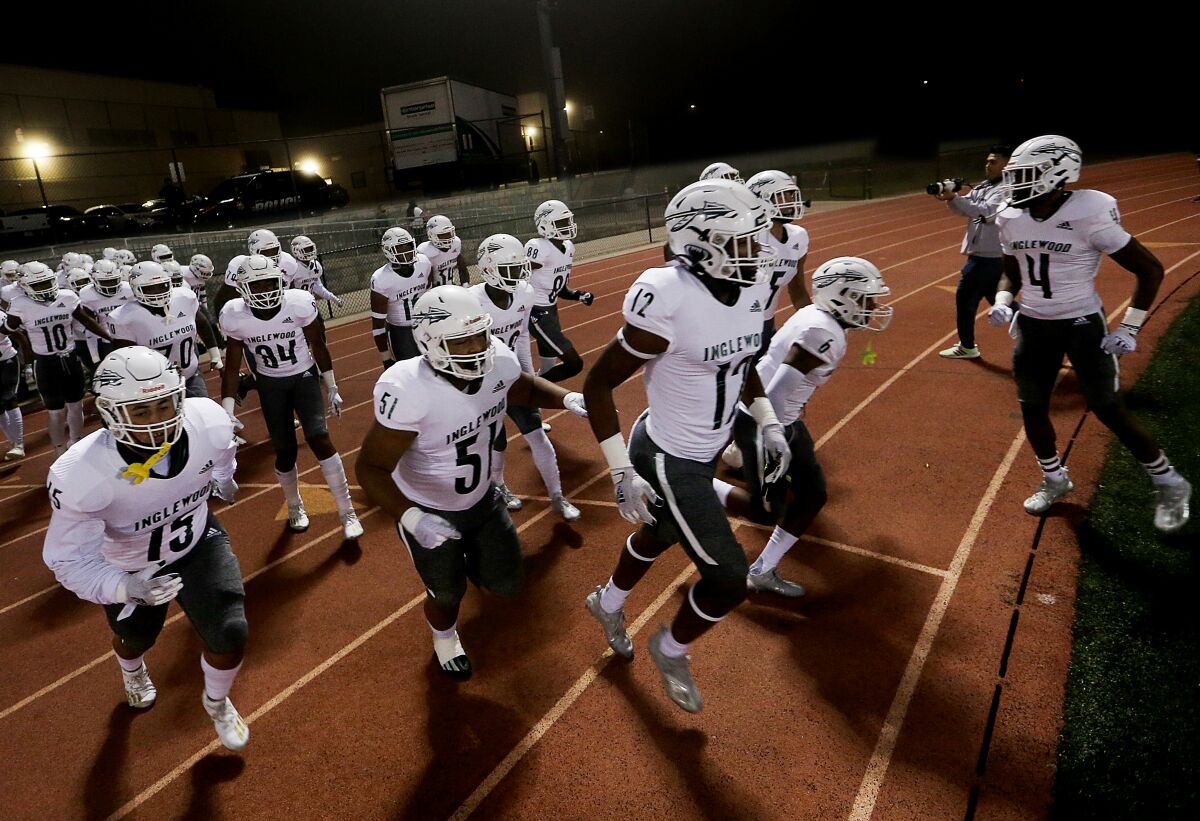 Inglewood takes the field for a Southern Section Division 2 playoff game against St. Bonaventure at Ventura College.