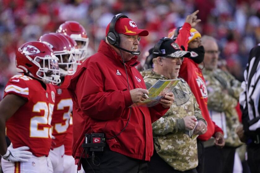Kansas City Chiefs head coach Andy Reid watches from the sidelines during the first half of an NFL football game against the Dallas Cowboys Sunday, Nov. 21, 2021, in Kansas City, Mo. (AP Photo/Ed Zurga)