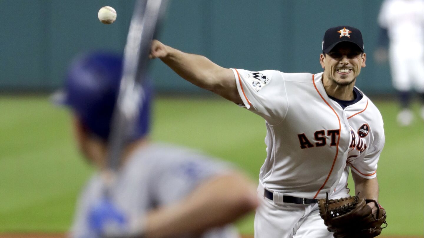 Houston Astros starting pitcher Charlie Morton throws to the Dodgers' Corey Seager during the first inning.