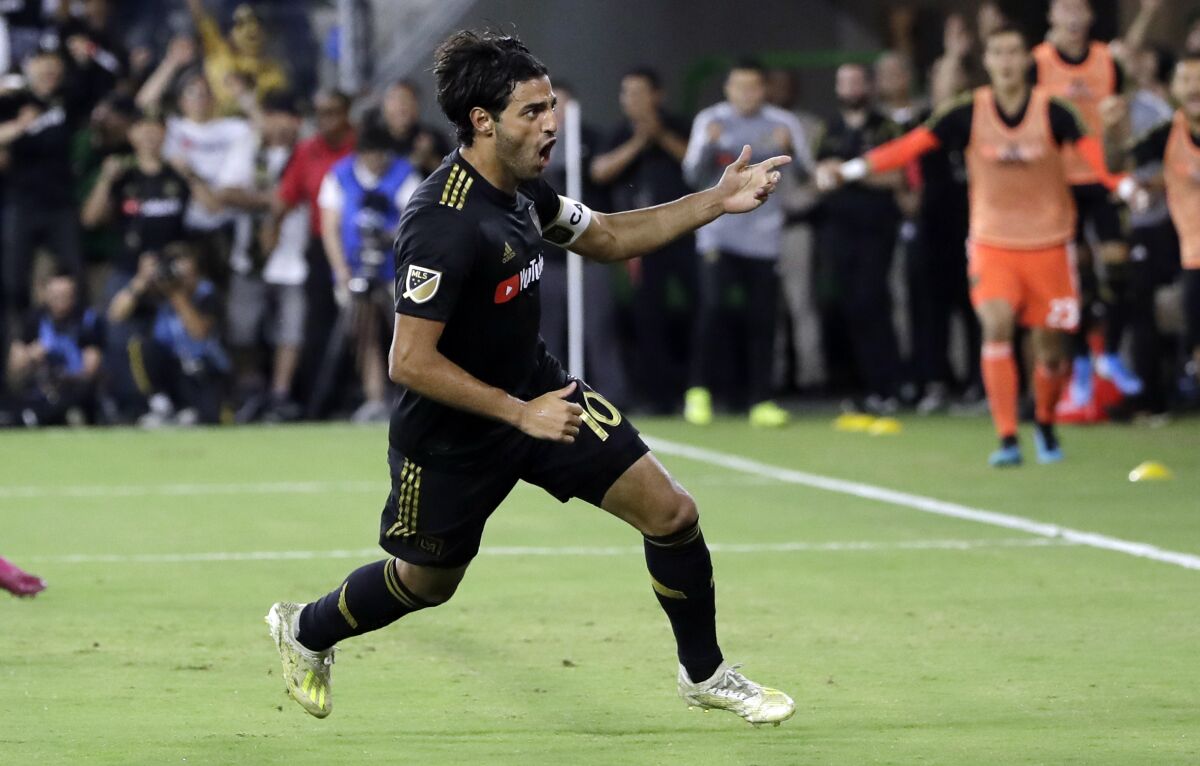 LAFC forward Carlos Vela celebrates after scoring against the Galaxy on Aug. 25.