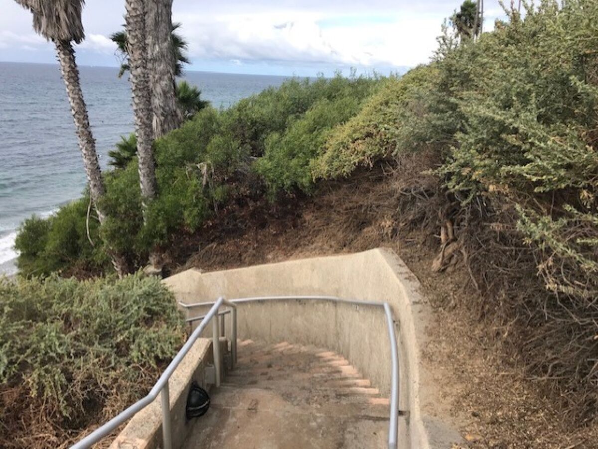 The spruced-up handrails on the stairs at Swami’s Beach.