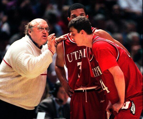 Utah Coach Rick Majerus instructs his players during a 1998 NCAA tournament game against Arizona.