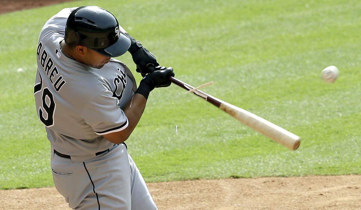 White Sox first baseman Jose Abreu breaks his bat as he flies out to left field against the Houston Astros in the fifth inning Saturday.