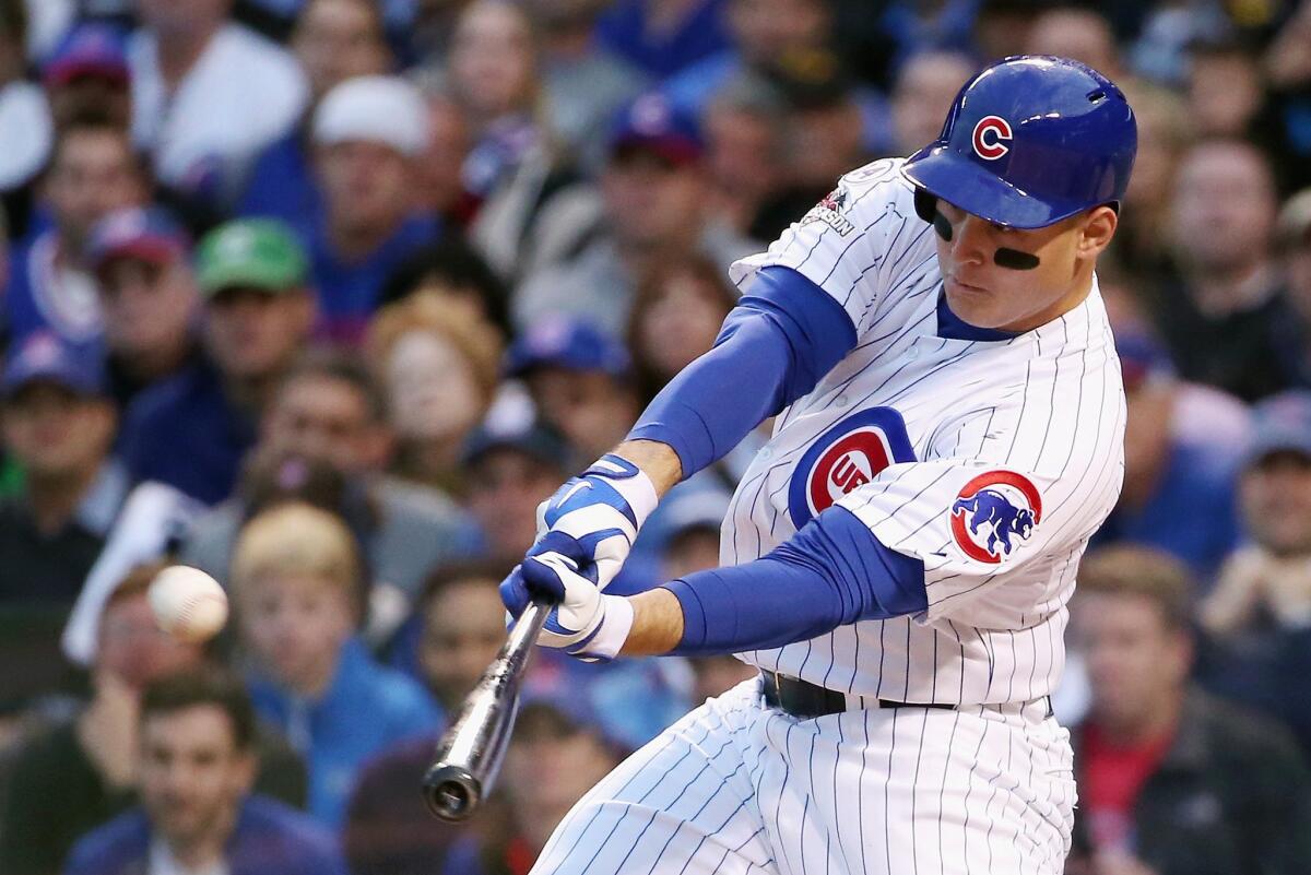 Chicago Cubs first baseman Anthony Rizzo hits a solo home run in the sixth inning against the St. Louis Cardinals during Game 4 of the National League division series.