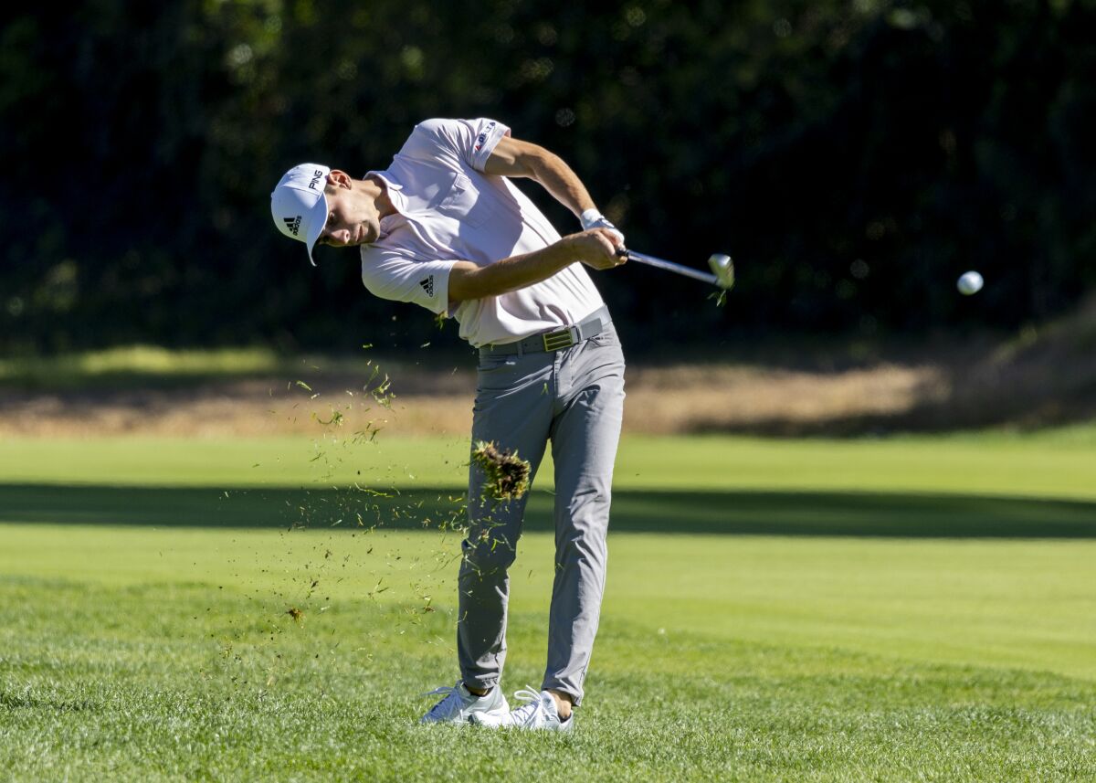 Joaquin Niemann hits his approach shot on the 12th hole during the second round of the Genesis Invitational.