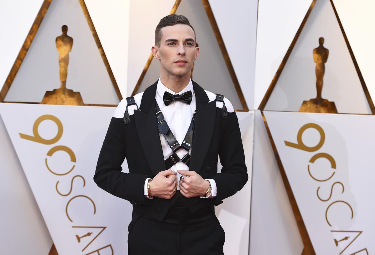Adam Rippon arrives at the Oscars on Sunday at the Dolby Theatre in Los Angeles.