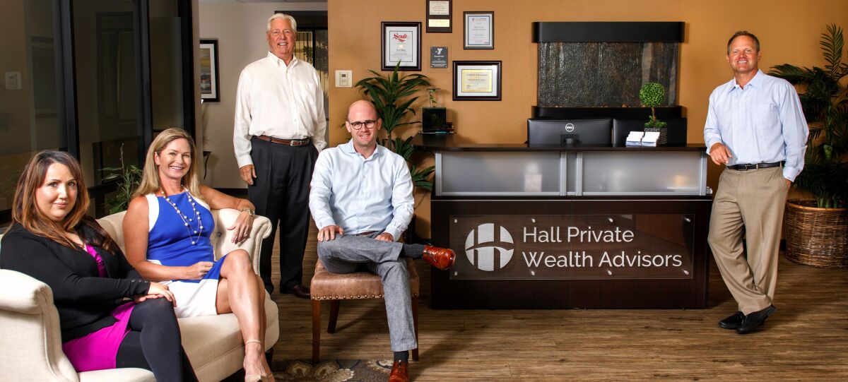 The team at Hall Private Wealth Advisors (l-r): Amanda Rocca, Natalie Quirarte, Patrick Maher, Clark Evans and company founder Russell Hall