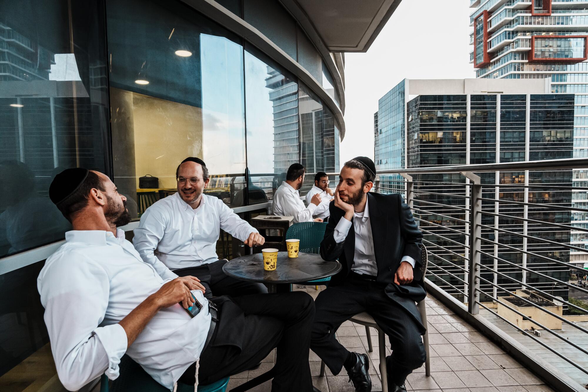  Students from Orthodox Jewish communities take a break in between classes where they learn how to code and program at JBH.