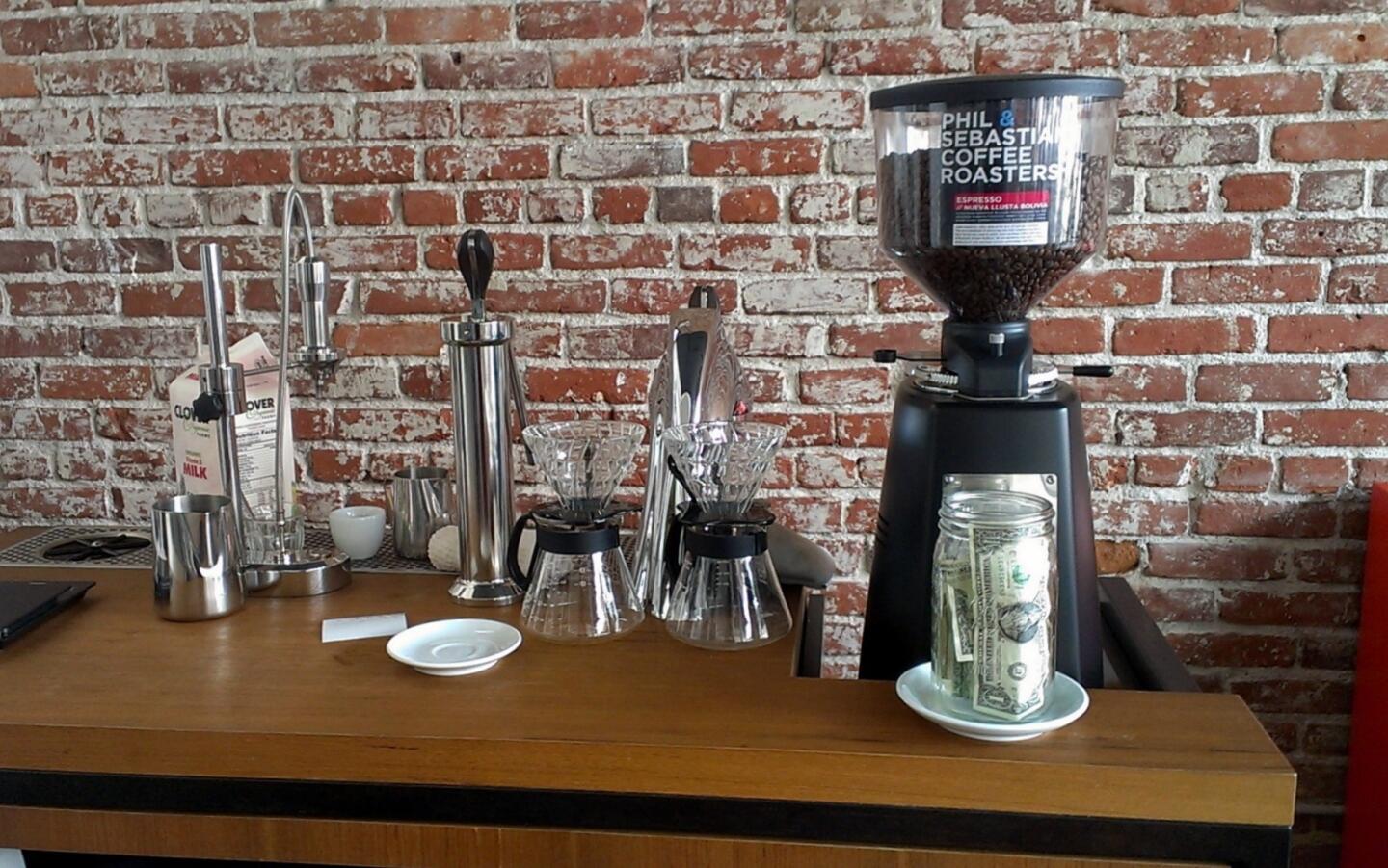 Cognoscenti Coffee's cart at Good Girl Dinette is equipped with a Modbar espresso making system, featuring espresso and pour-over "modules."