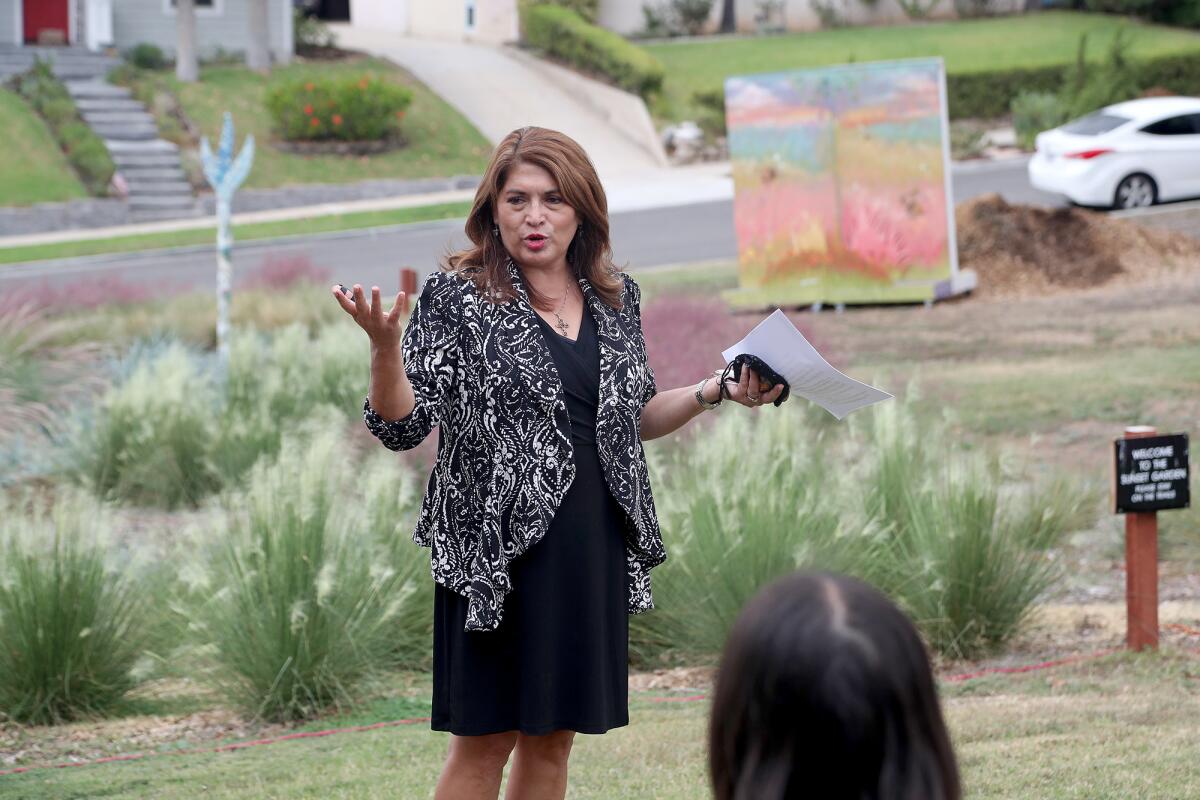 Assemblywoman Sharon Quirk-Silva speaks during a dedication ceremony for the new "Sunset Garden." 