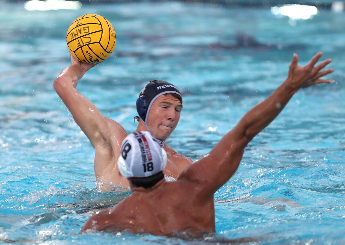 Newport Harbor's Peter Castillo fires in a goal in Wednesday's match.