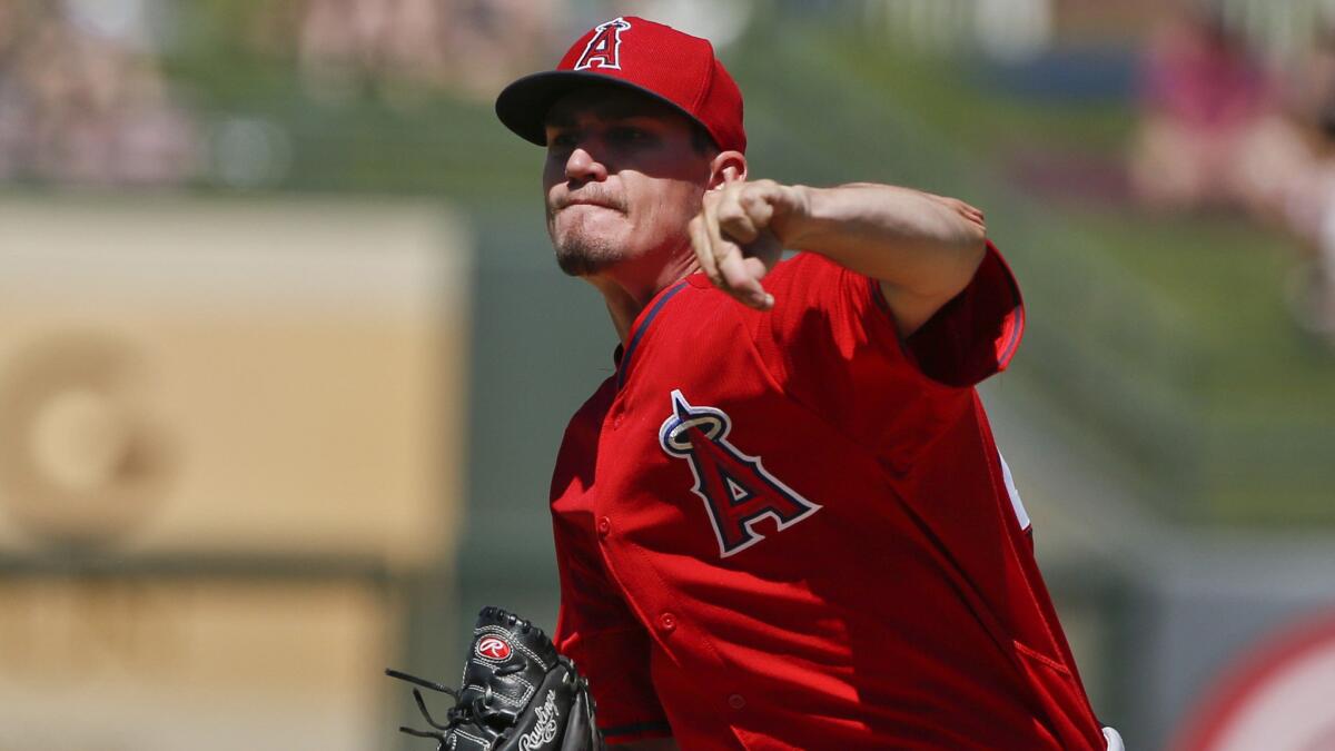Angels starter Andrew Heaney delivers a pitch during an exhibition game against the Texas Rangers in Surprise, Ariz., on March 24.