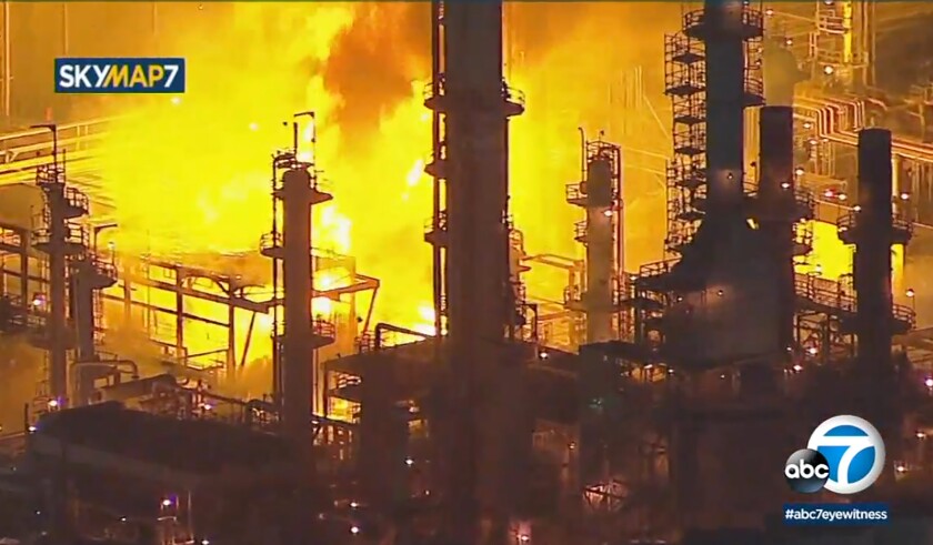 Aerial image shows fire burning at the Marathon Petroleum refinery in Carson on Tuesday night
