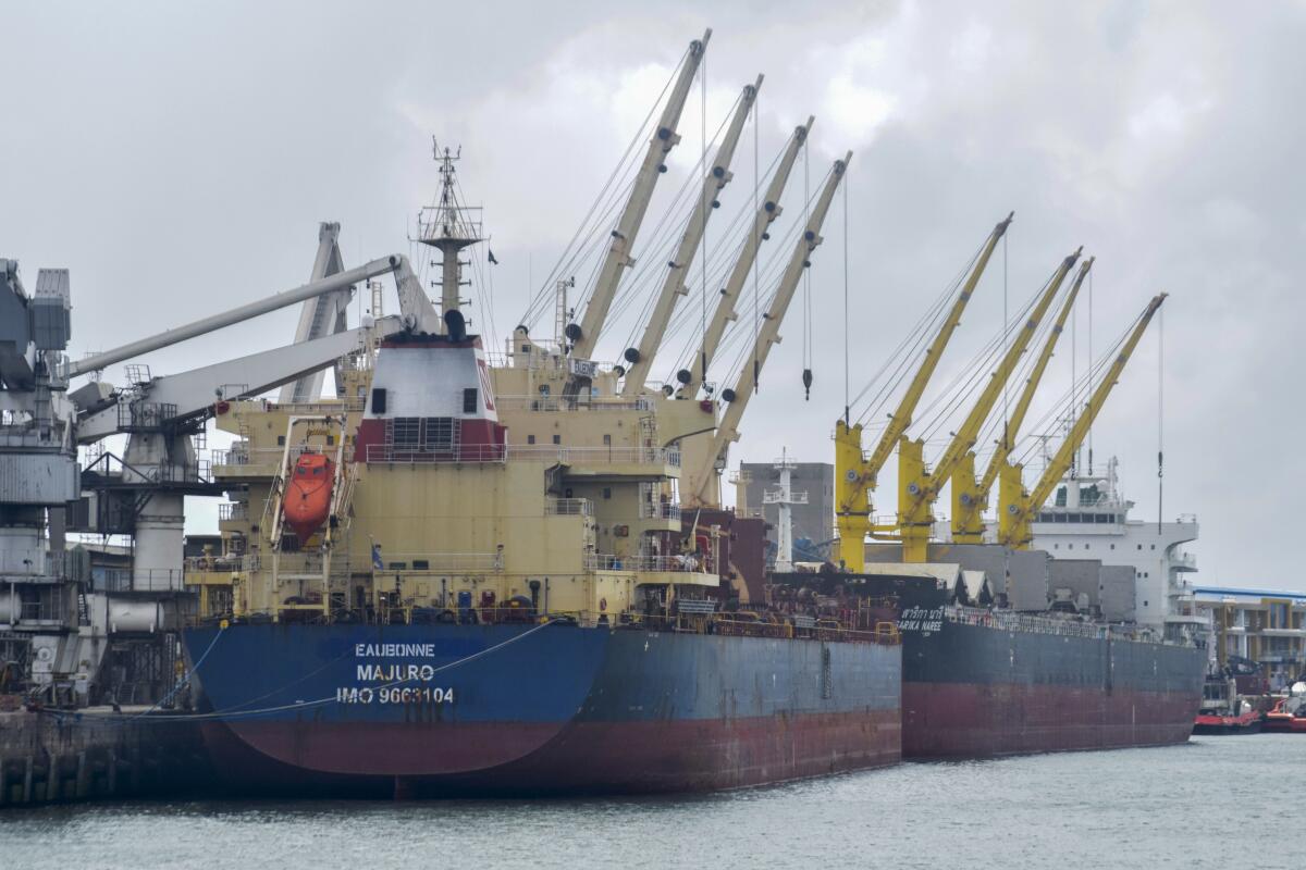The Eaubonne bulk carrier ship docks in a port.