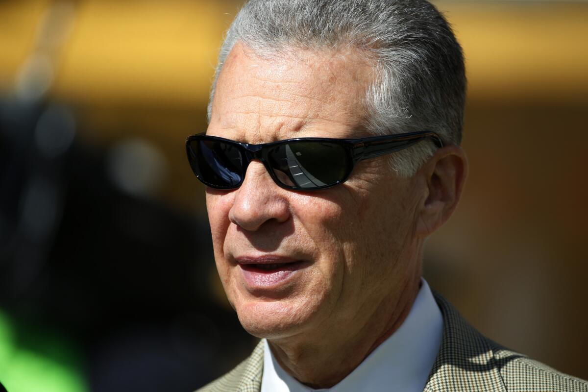 Art Rooney II, owner of the Pittsburgh Steelers, visits the sidelines during warm ups before a game against the 49ers.