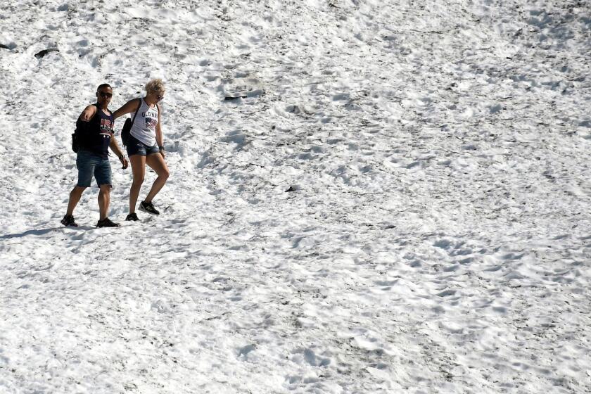 GIRDWOOD, AK - JULY 04: People hike on the Byron Glacier on July 4, 2019 near Portage Lake in Girdwood, Alaska. Alaska is bracing for record warm temperatures and dry conditions in parts of the state. (Photo by Lance King/Getty Images) ** OUTS - ELSENT, FPG, CM - OUTS * NM, PH, VA if sourced by CT, LA or MoD **