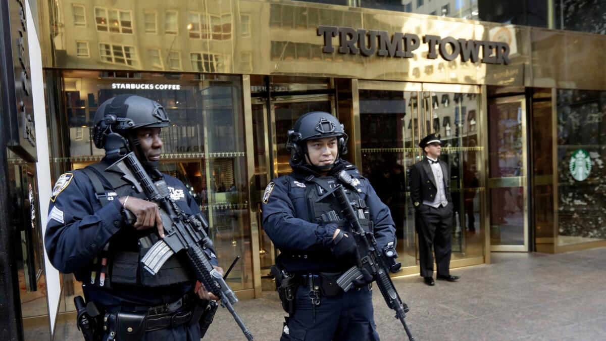 New York police officers guard the front of Trump Tower. ( Richard Drew / Associated Press )