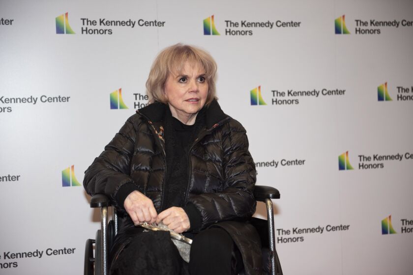 2019 Kennedy Center Honoree singer Linda Ronstadt arrives at the State Department for the Kennedy Center Honors State Department Dinner on Saturday, Dec. 7, 2019, in Washington. (AP Photo/Kevin Wolf)