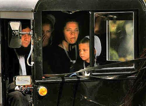 An Amish family in Bart Township, Pa., takes part in the funeral procession for Naomi Rose Ebersole, 7, one of the slain schoolgirls.