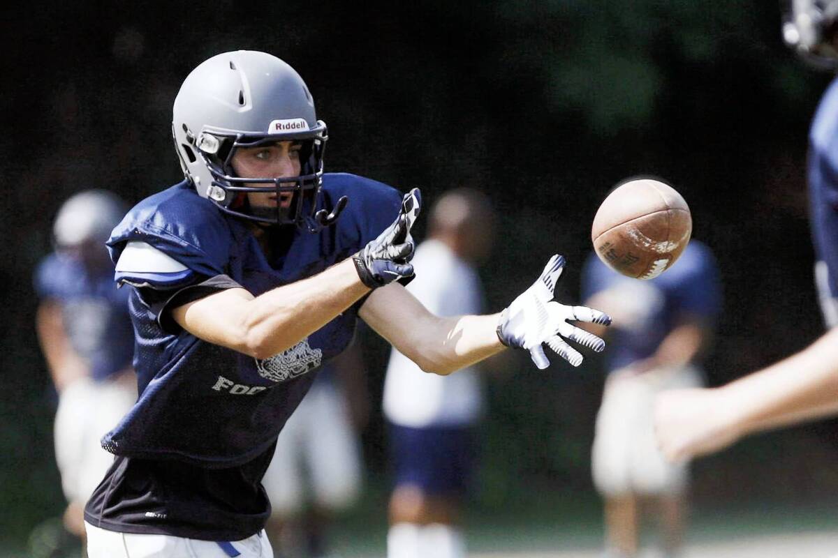 Flintridge Prep's Kareem Ismail catches the ball during practice at Flintridge Prep.