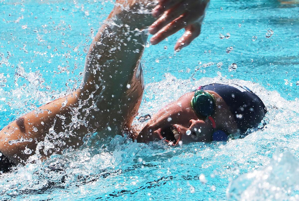 Corona del Mar's Alex Milisavljevic competes in the girls' 200 yard freestyle final during Friday's meet.