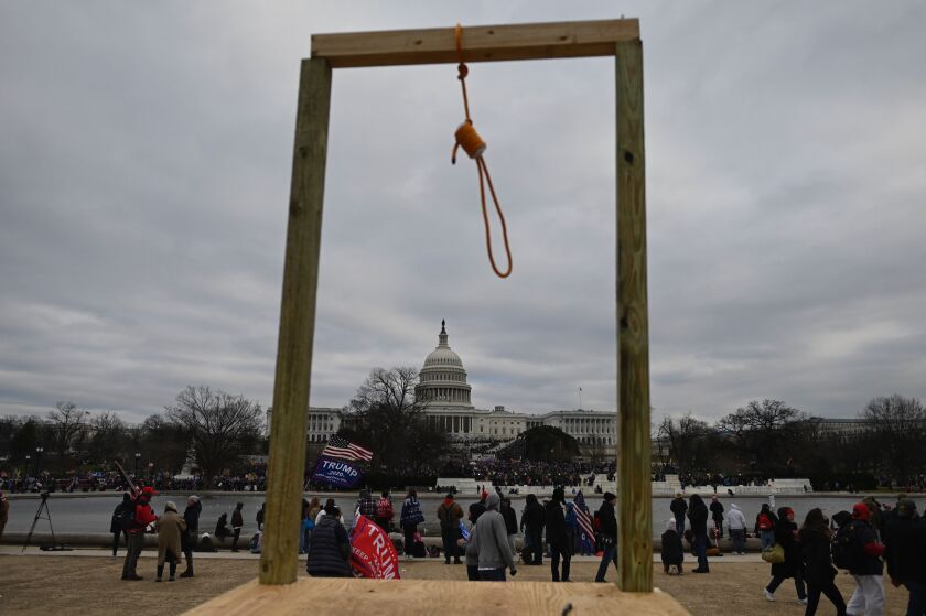 A noose attached to a wooden beam was erected outside the U.S. Capitol as backers of President Trump stormed inside Jan. 6.