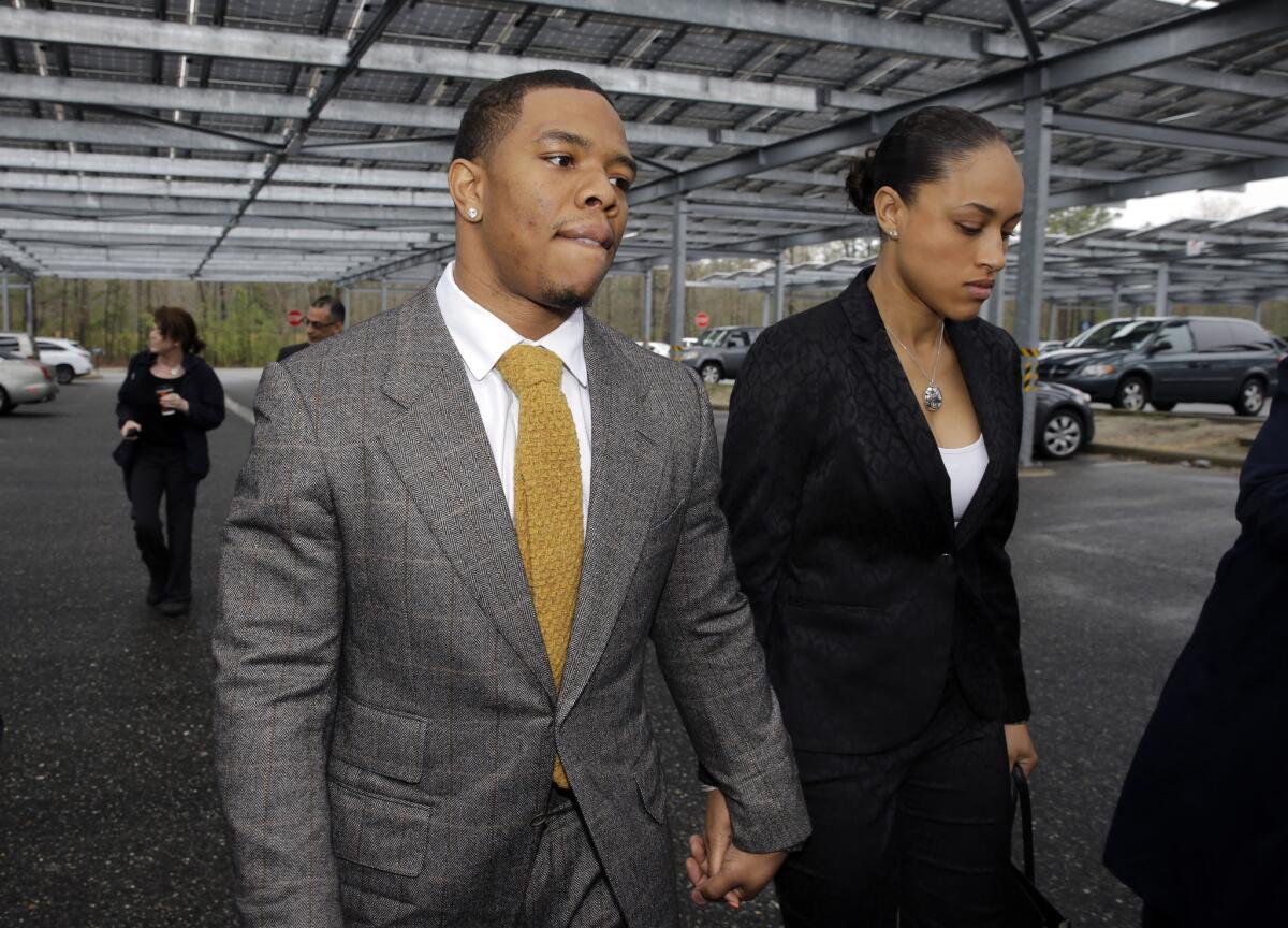 Ravens running back Ray Rice holds hands with his wife, Janay, as they arrive at Atlantic County Criminal Courthouse in Mays Landing, N.J., on May 1.