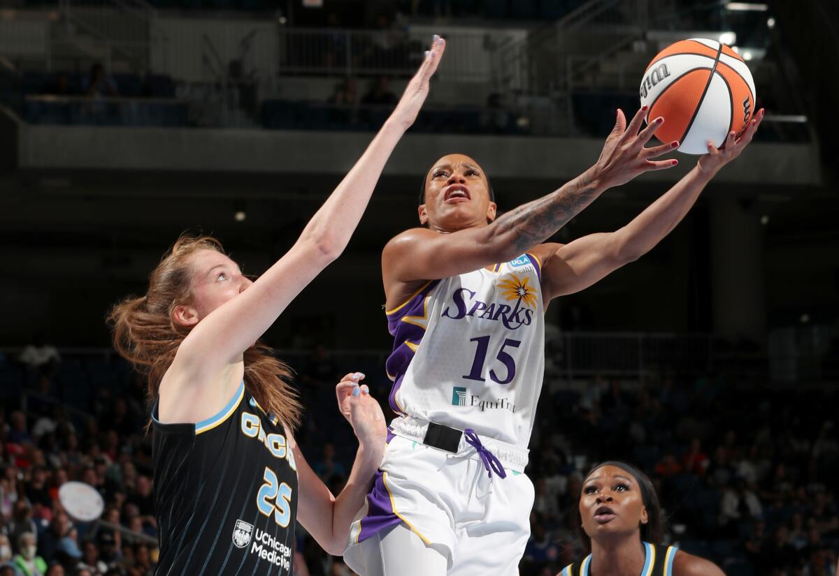 Sparks forward Jasmine Thomas attempts a layup against the Sky on Friday night in Chicago.