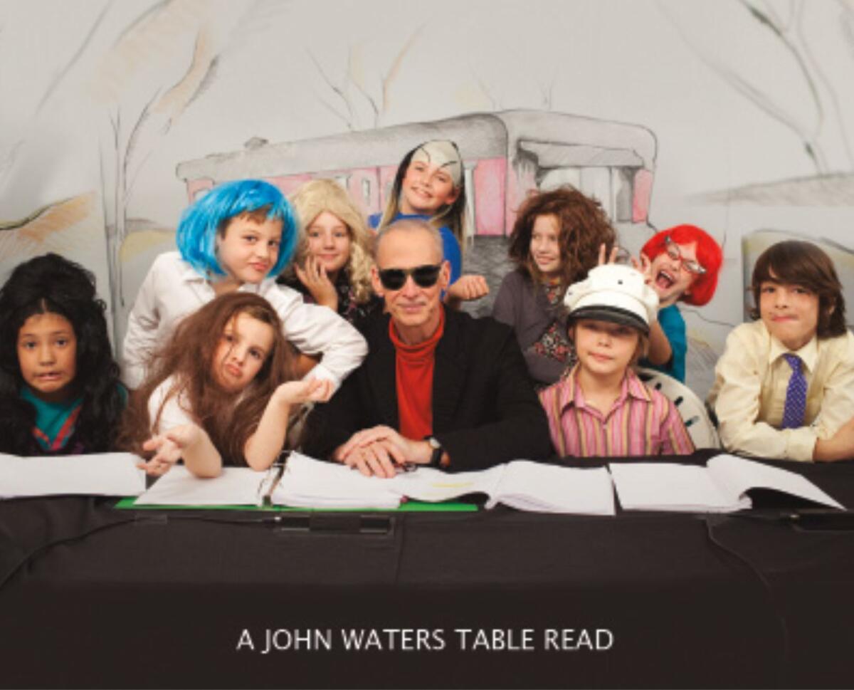 John Waters with a group of children.