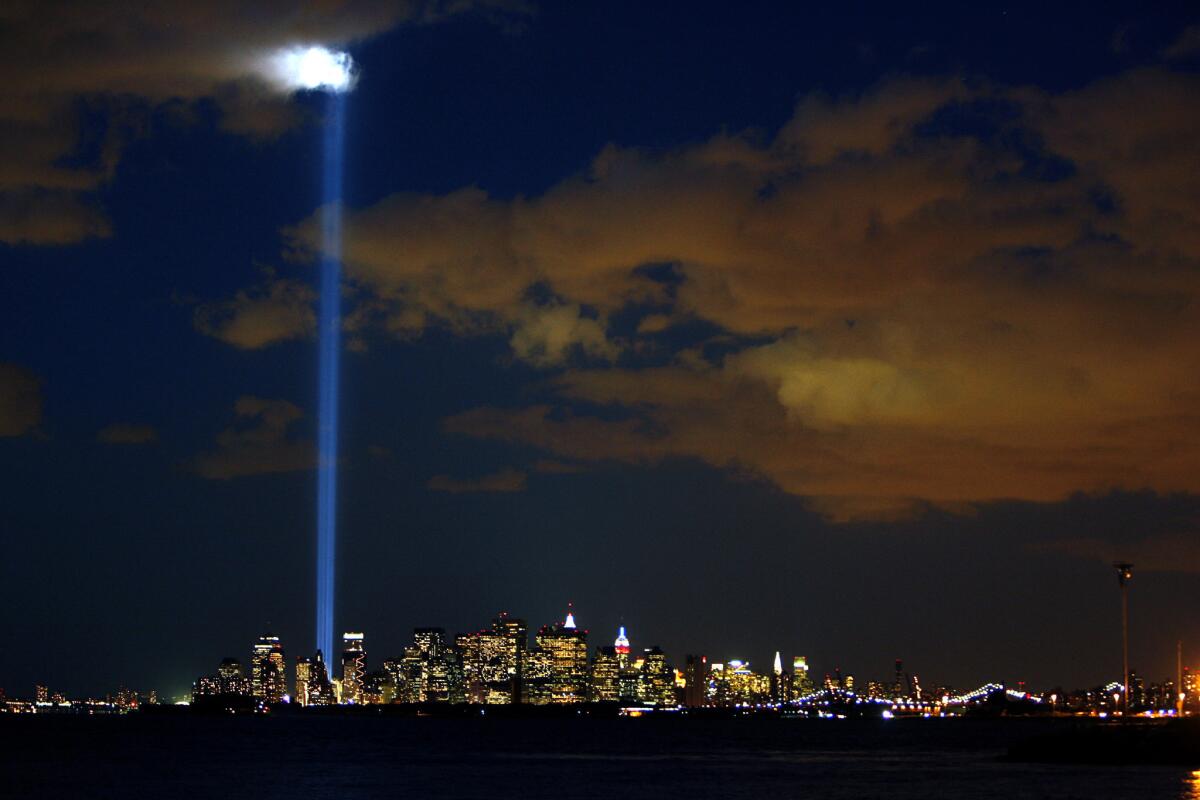 Lights symbolizing the twin towers of the World Trade Center light up the sky over Manhattan on the fifth anniversary of the Sept. 11 attacks. Almost 12 years after the attacks, the remains of firefighter Jeffrey Walz have been identified.