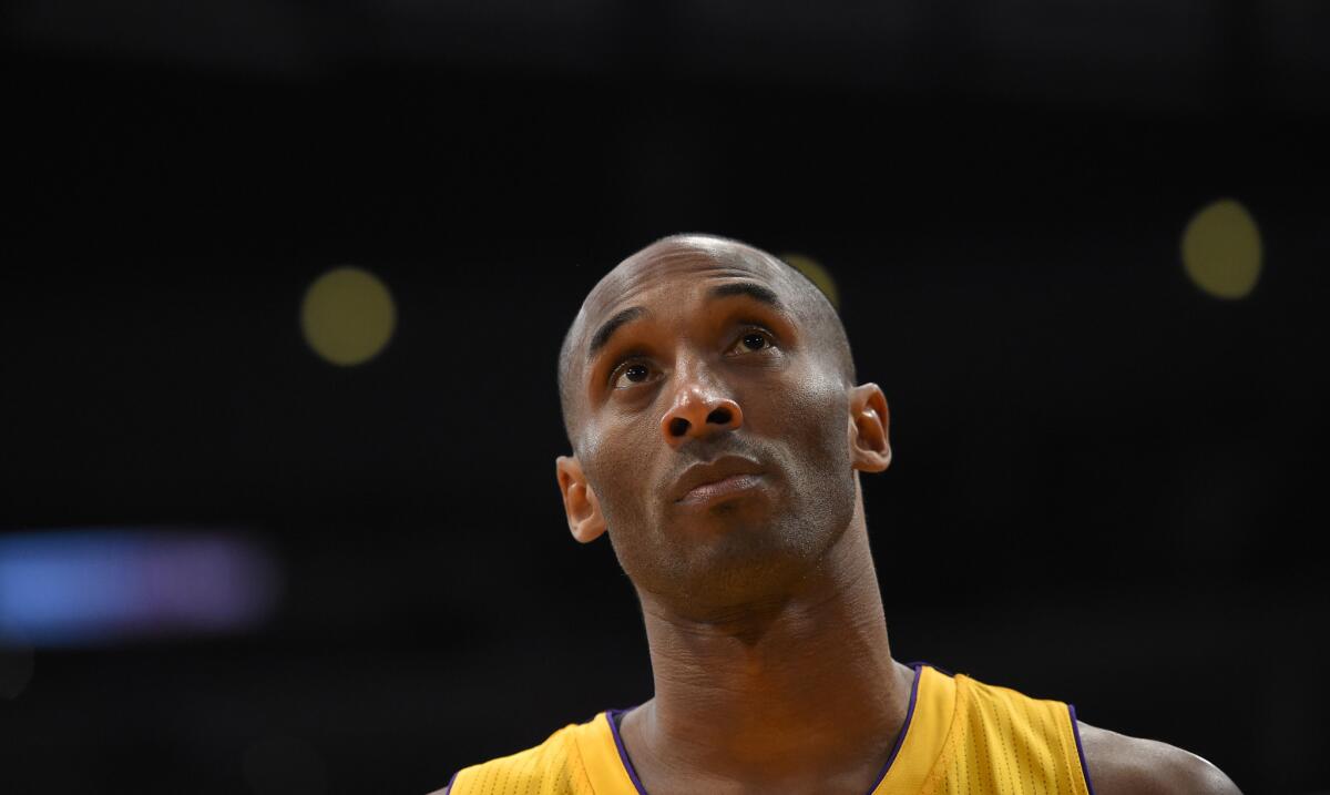 Lakers forward Kobe Bryant looks toward the scoreboard during a game against Oklahoma City on Jan. 8.