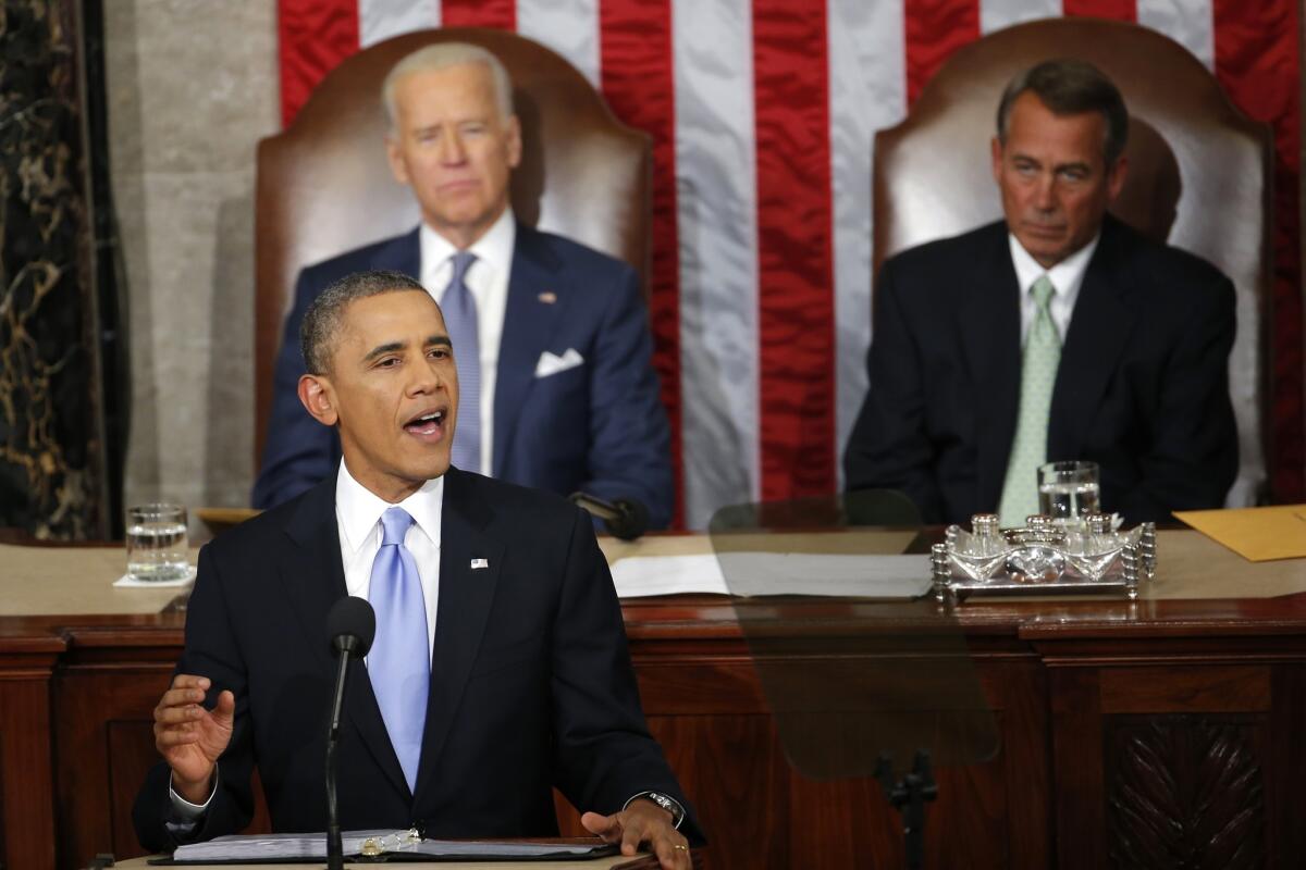 President Obama delivers his State of the Union address, as Vice President Joe Biden and House Speaker John A. Boehner (R-Ohio) look on.