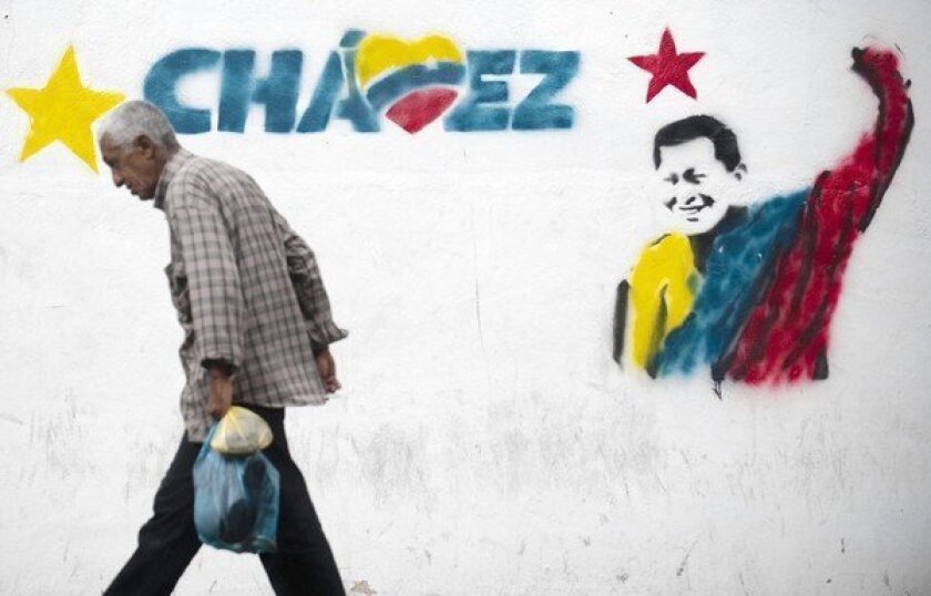 A mural on a wall in Caracas, Venezuela, professes support for ailing President Hugo Chavez.
