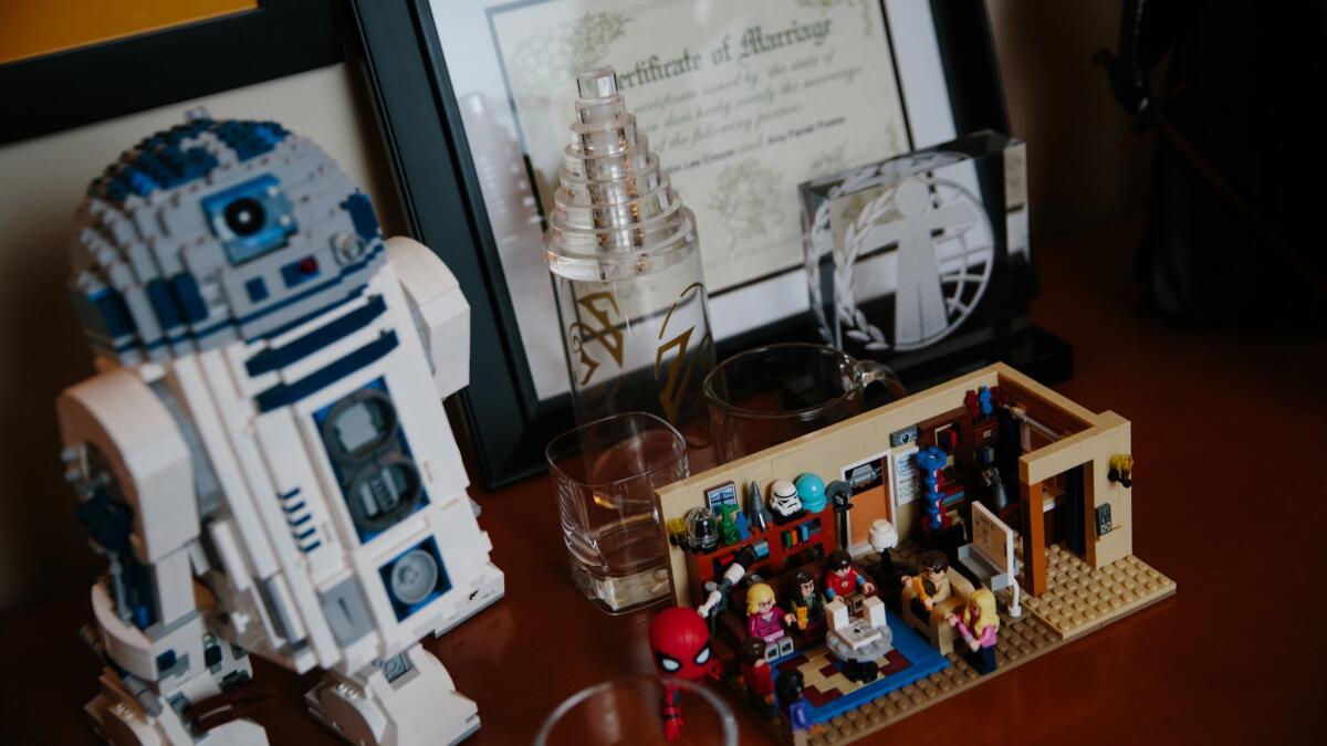 The marriage certificate for "Big Bang Theory" characters Amy and Sheldon, a Lego version of the set and cast, and other items in Steve Holland's office.