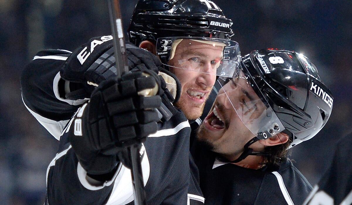 Kings forward Jeff Carter (77) celebrates his goal against the Blue Jackets with defenseman Drew Doughty in the second period Sunday at Staples Center.
