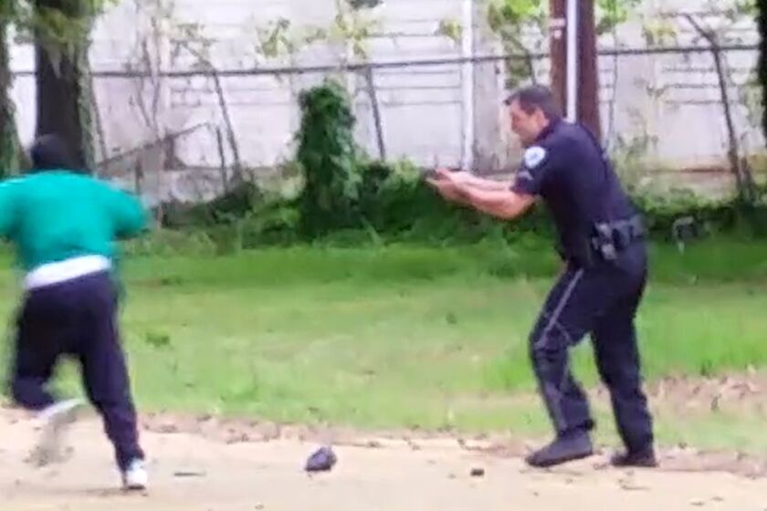 An image taken from a video shows Walter Scott fleeing North Charleston Police Officer Michael Slager, who faces a murder charge for fatally shooting Scott last year.